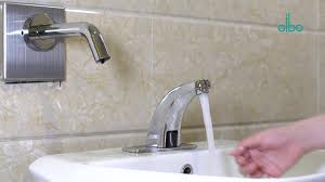 Modern smart faucet in a kitchen, activated by touchless technology for convenience and water efficiency.