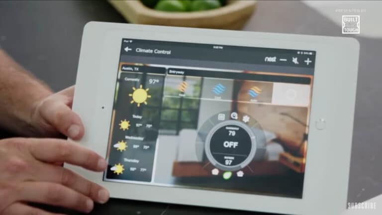 Tablet displaying a climate and lighting control interface, demonstrating the convenience of a smart home manager.