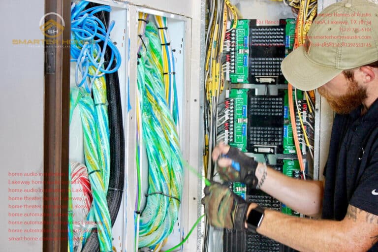Technician wiring a control panel, demonstrating the technical foundation of home automation systems.